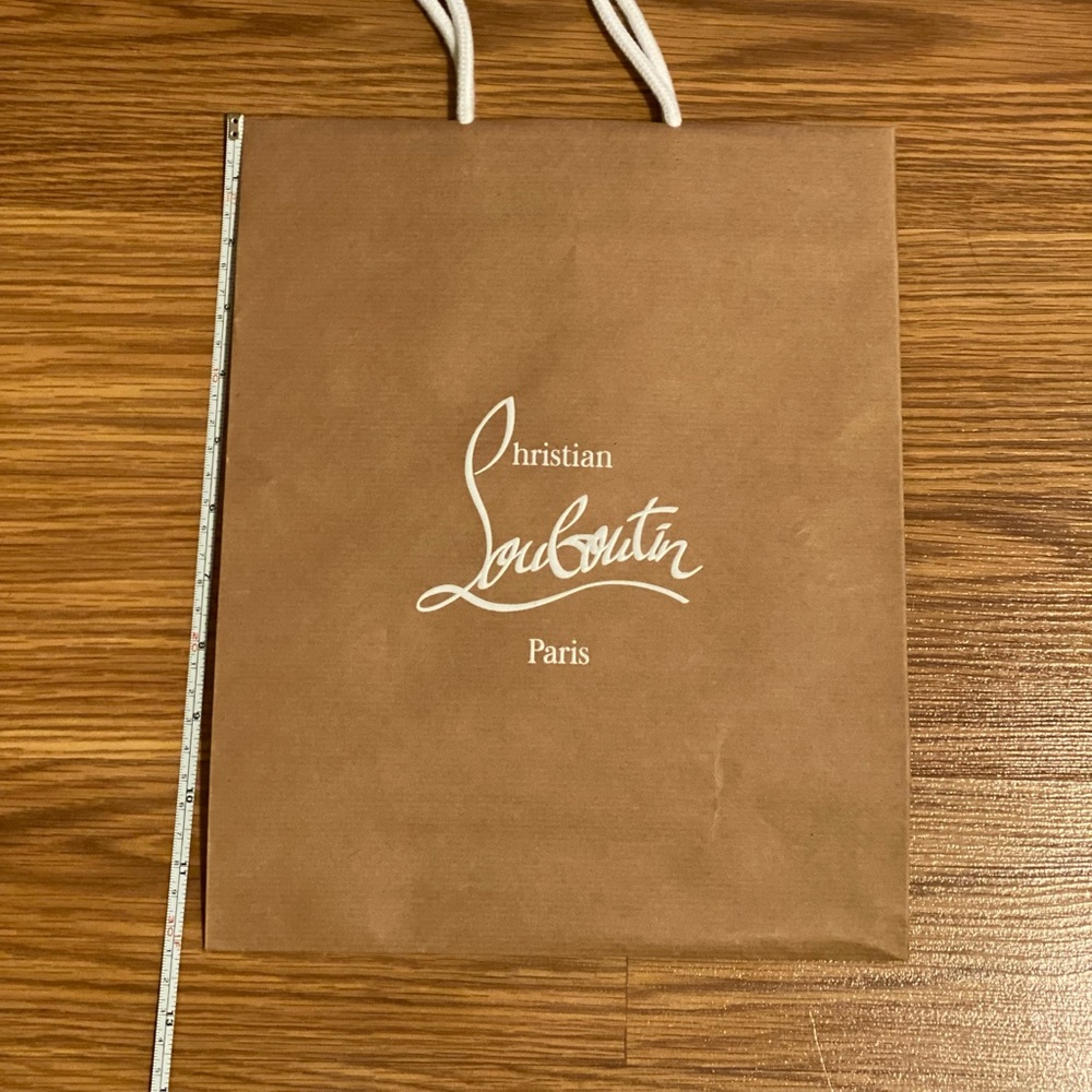 Louboutin shopping bag.